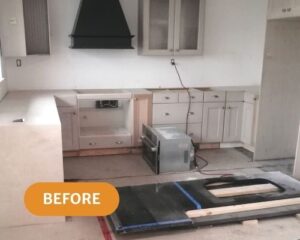 A pile of stone needing countertop cutting Victoria BC. Dark stone in white kitchen.